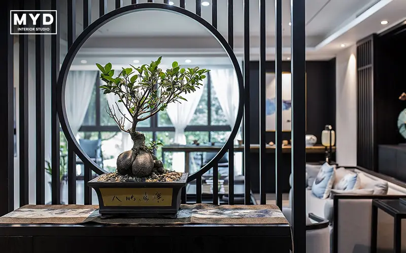 Bonsai centerpiece in modern oriental living room.